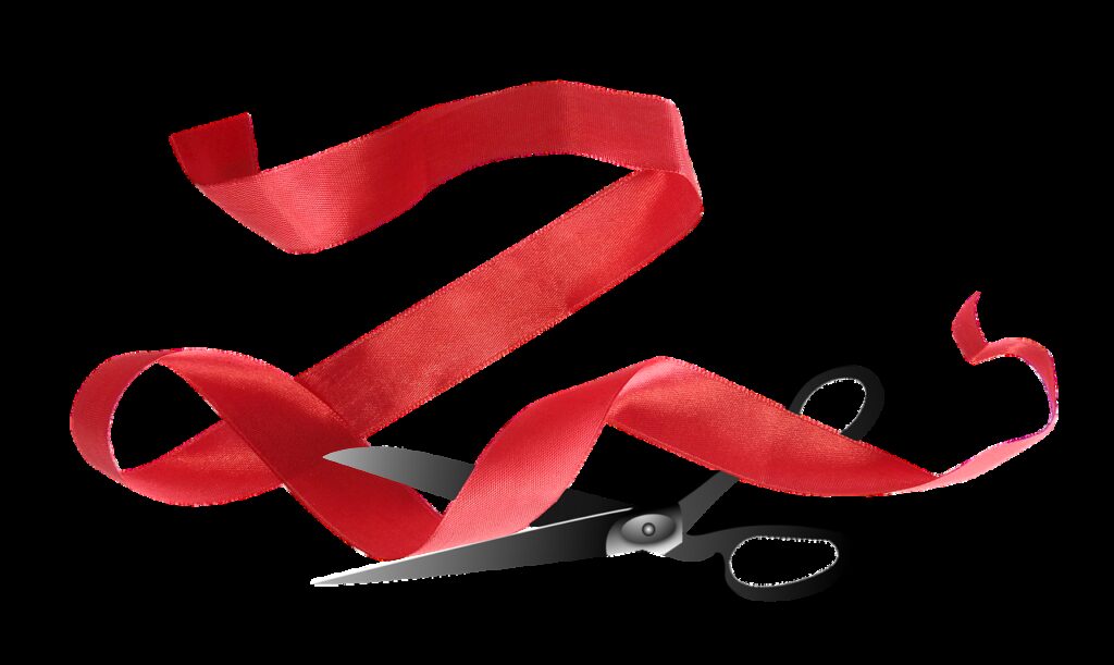 red tape, red ribbon, scissors