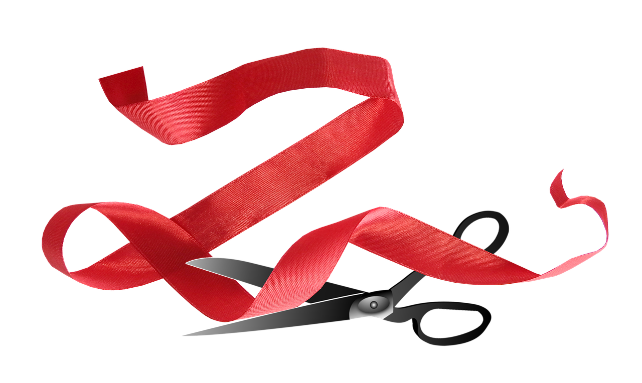 red tape, red ribbon, scissors
